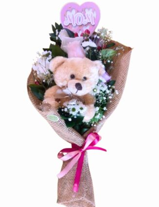 Ramillete de rosas y peluche