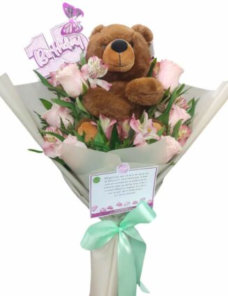 Ramillete de rosas y Peluche